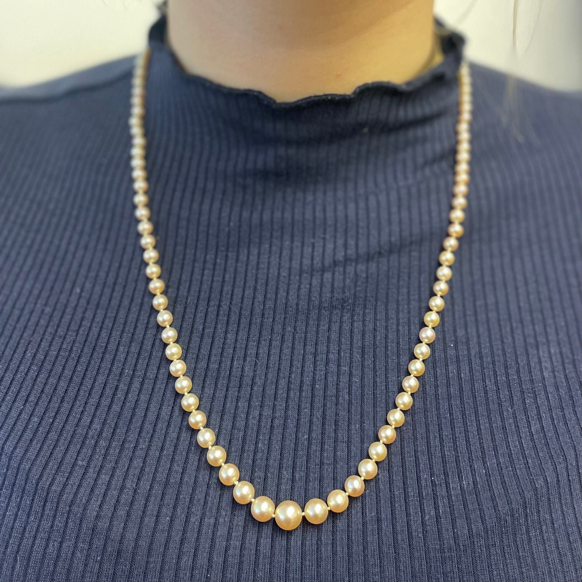 1930s Platinum Natural Pearl & Diamond Necklace worn on neck