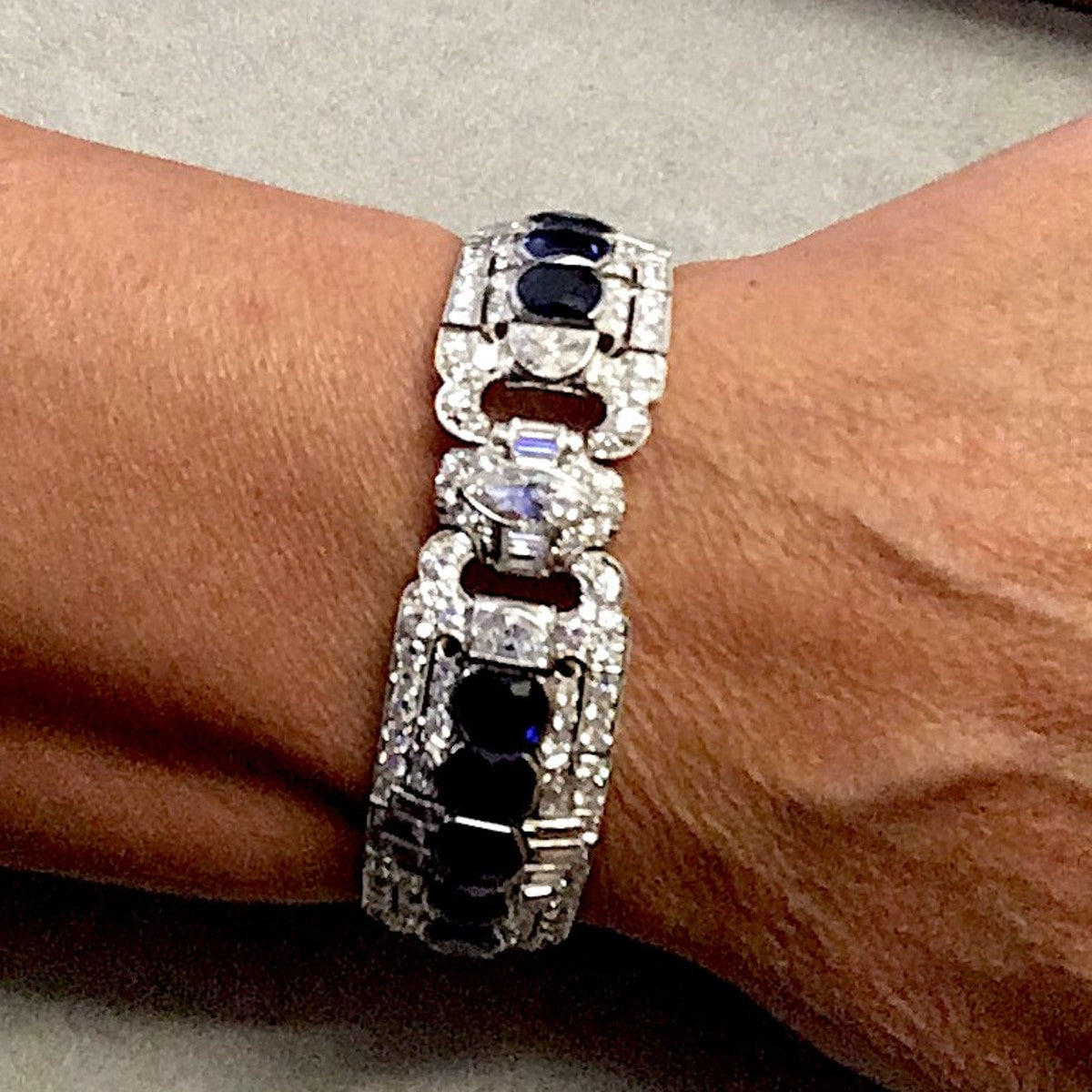 Art Deco Platinum Unheated Sapphire & Diamond Bracelet worn on wrist