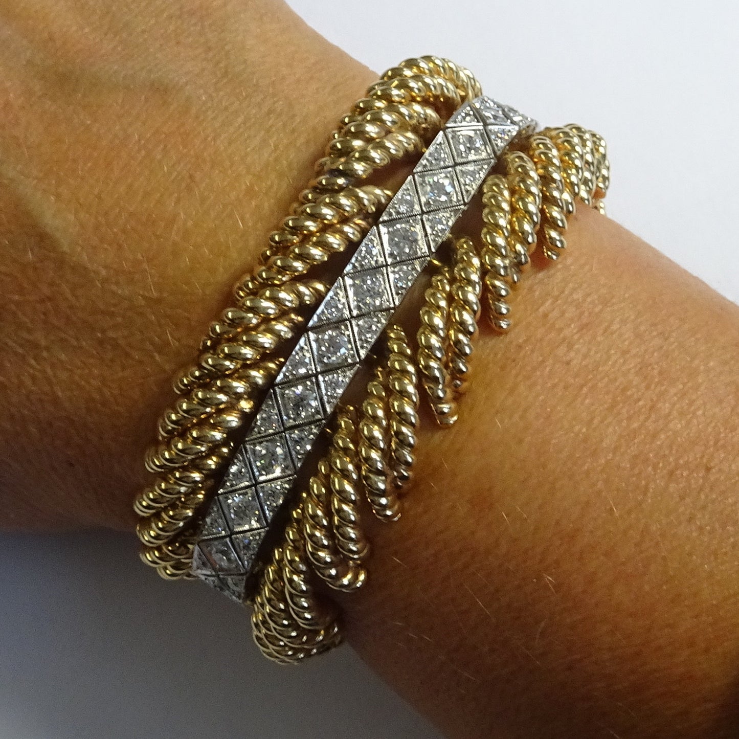 Fulco Di Verdura 1940s 18KT Yellow Gold & Platinum Diamond Bracelet on wrist