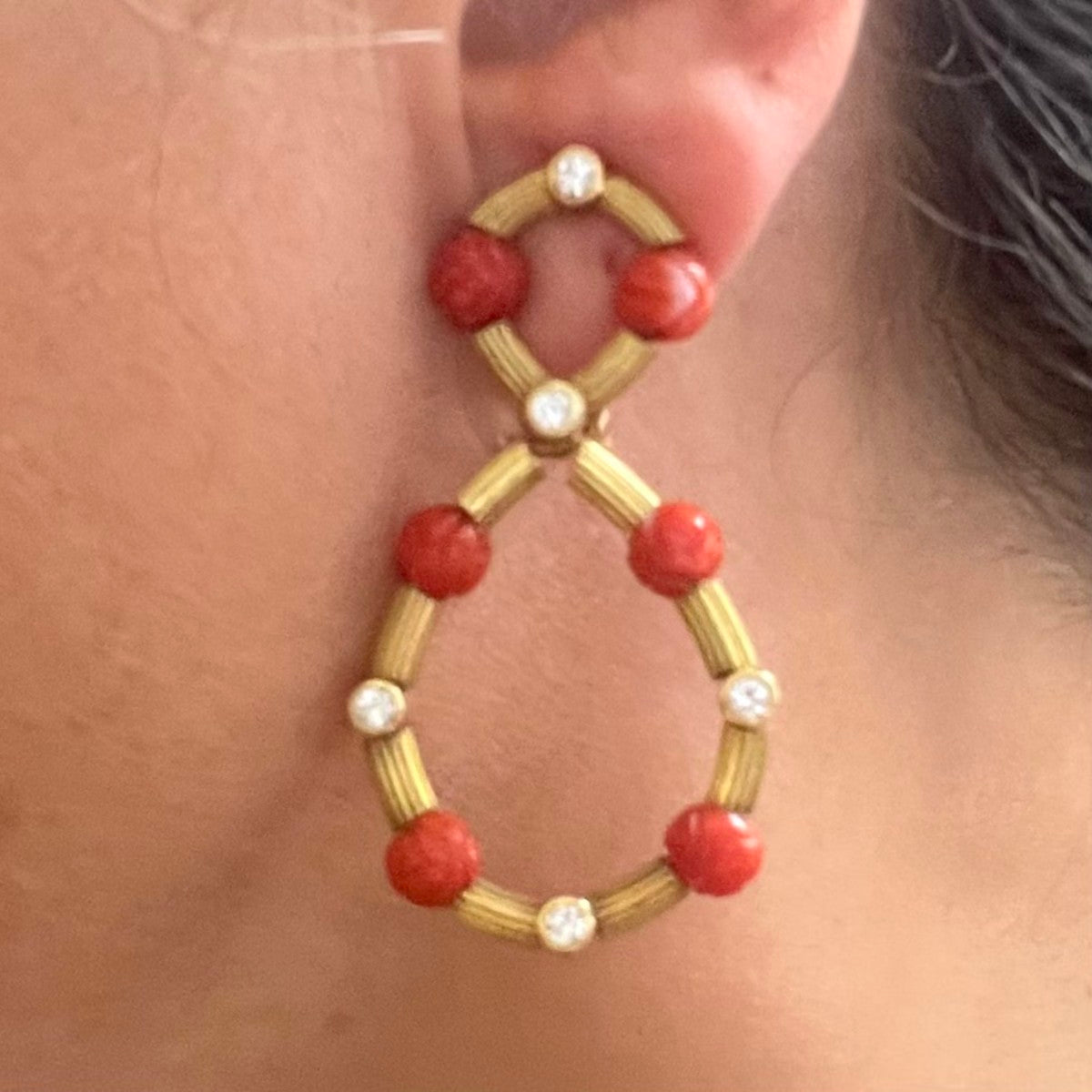 1960s 18KT Yellow Gold Coral & Diamond Earrings worn on ear