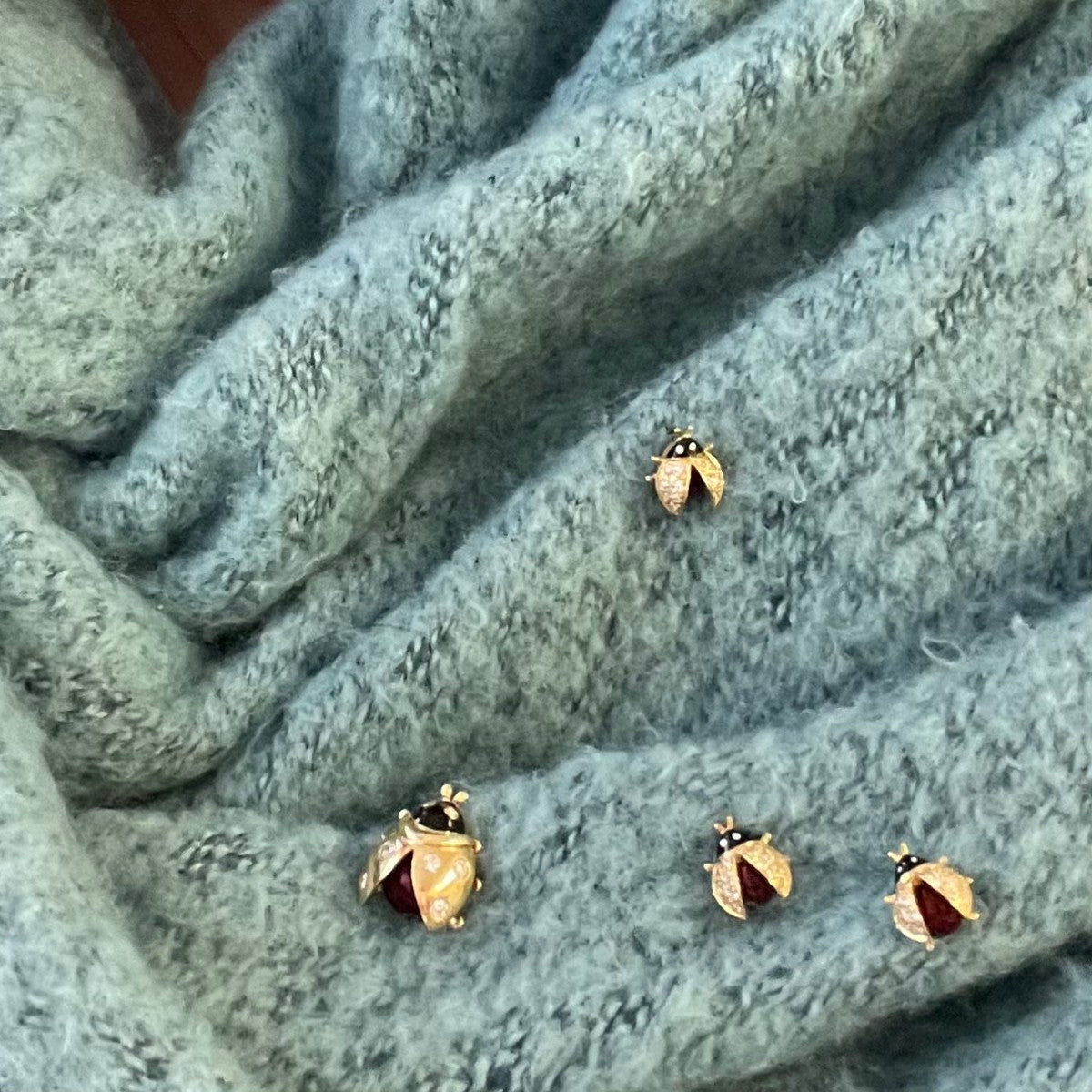 Meister Post-1980s 18KT Yellow Gold Enamel & Diamond Ladybug Brooches worn on scarf
