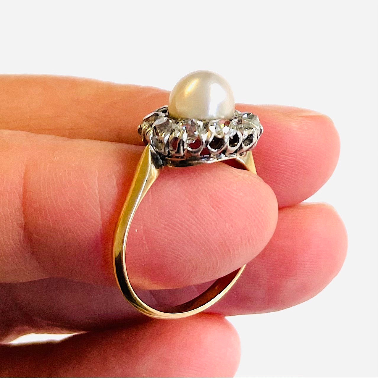 Victorian Silver & 18KT Yellow Gold Natural Pearl & Diamond Ring in hand