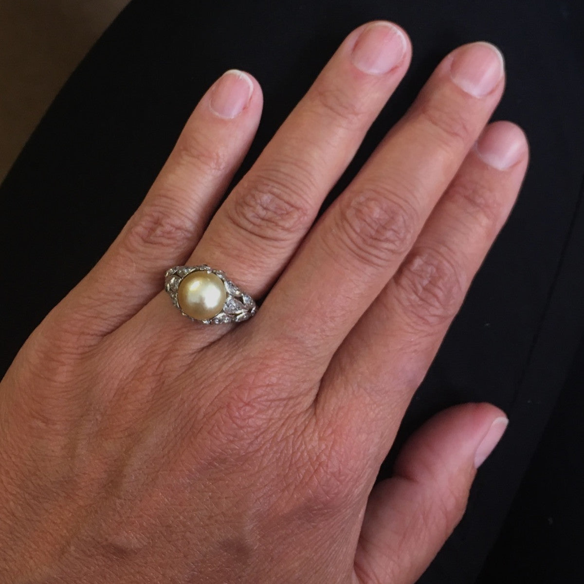 Edwardian Platinum & 18KT Yellow Gold Natural Pearl & Diamond Ring on finger