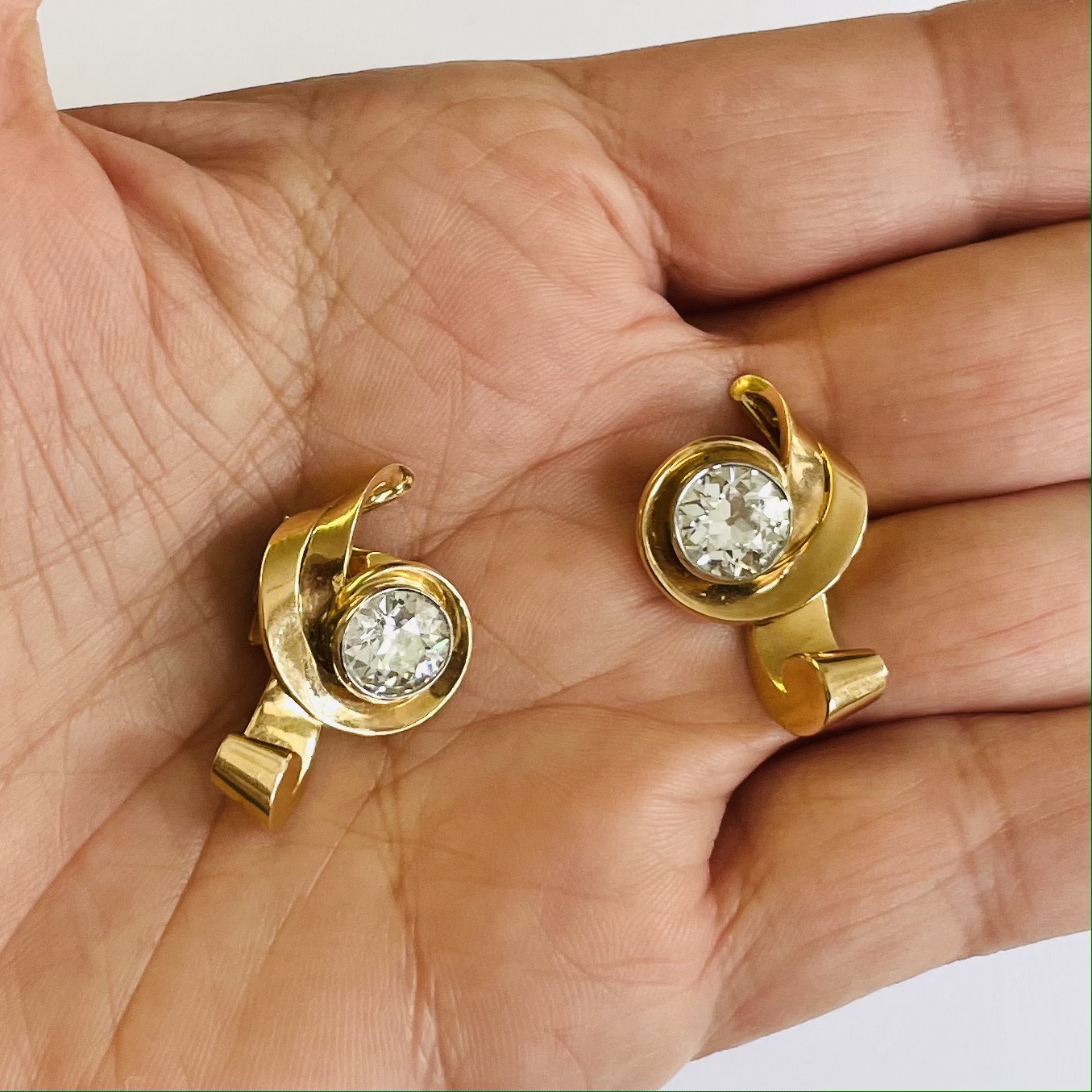 French 1950s Platinum & 18KT Yellow Gold Diamond Earrings in hand