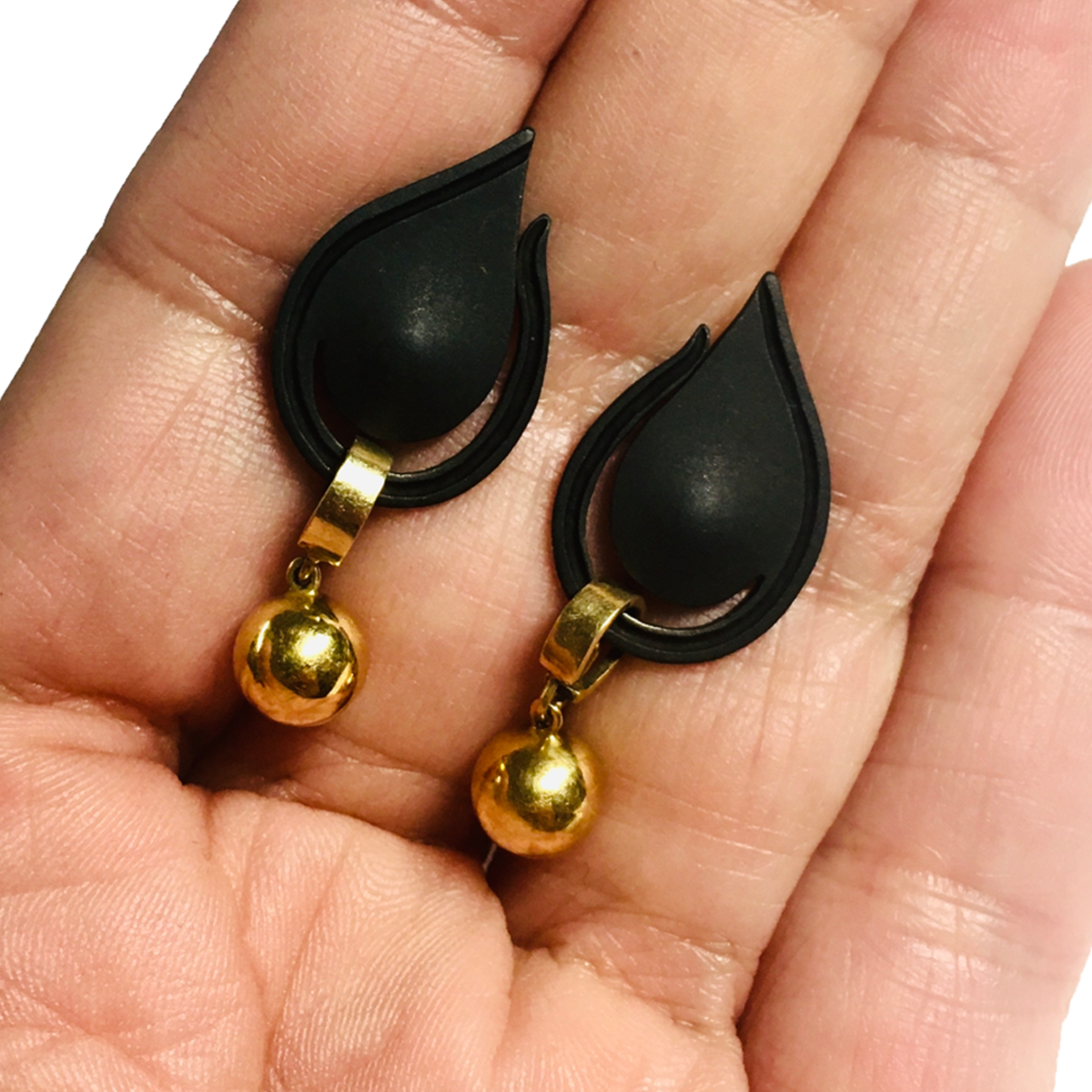 Marsh's Art Nouveau 14KT Yellow Gold Suite earrings in hand