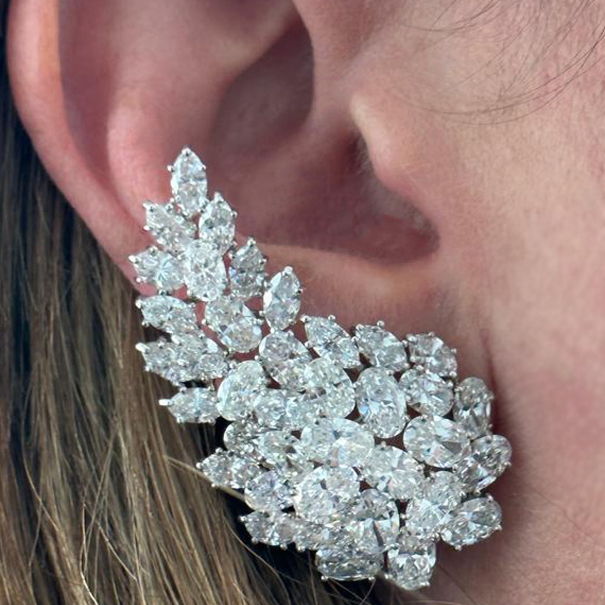 Hammerman Brothers 1970s Platinum Diamond Earrings worn on ear