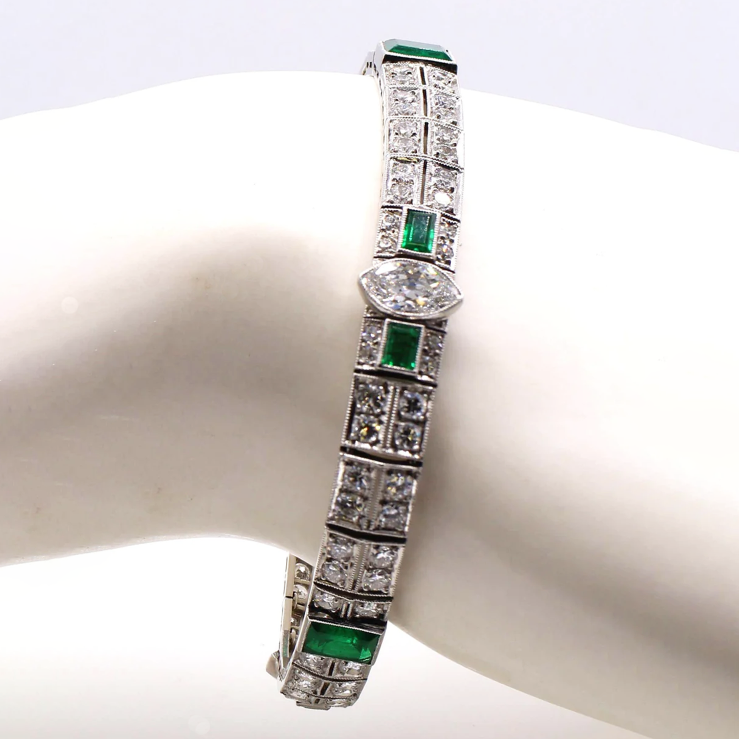 Cartier Art Deco Platinum Diamond & Emerald Bracelet on wrist