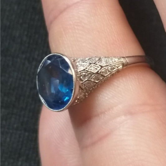 Post-1980s Platinum Sapphire & Diamond Ring on finger