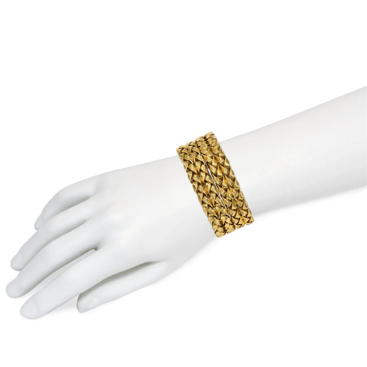 German 1960s 18KT Yellow Gold Bracelets on wrist