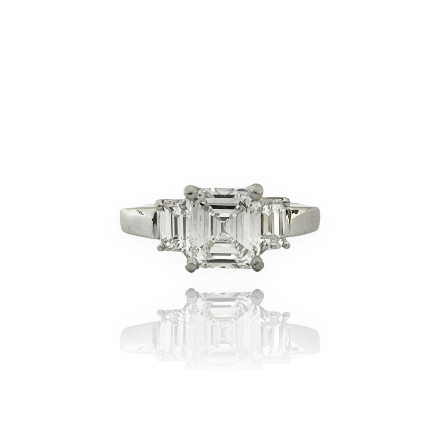 1980s Platinum Diamond Three-Stone Ring front view