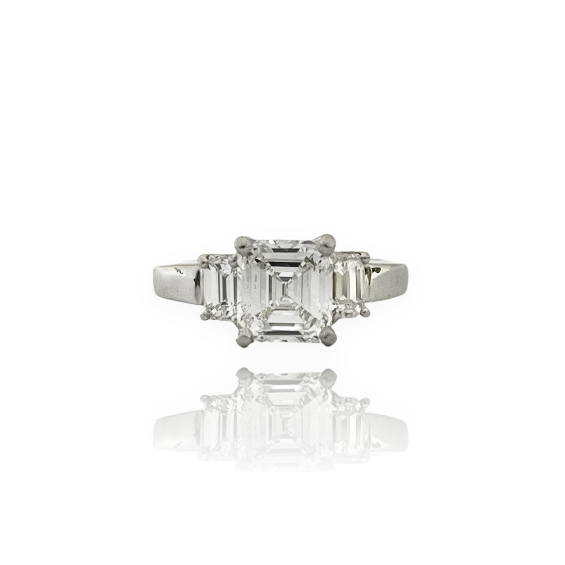 1980s Platinum Diamond Three-Stone Ring front view