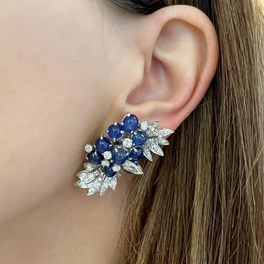 David Webb 1950s Platinum Sapphire & Diamond Earrings on ear