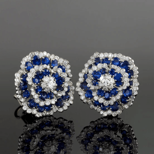 Van Cleef & Arpels 1960s Platinum Diamond & Sapphire Camellia Earrings front
