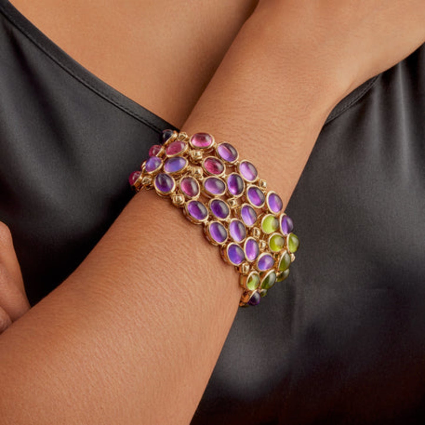 Rene Boivin French 1980s 18KT Yellow Gold Tourmaline, Amethyst, Peridot & Sapphire Bracelet on wrist