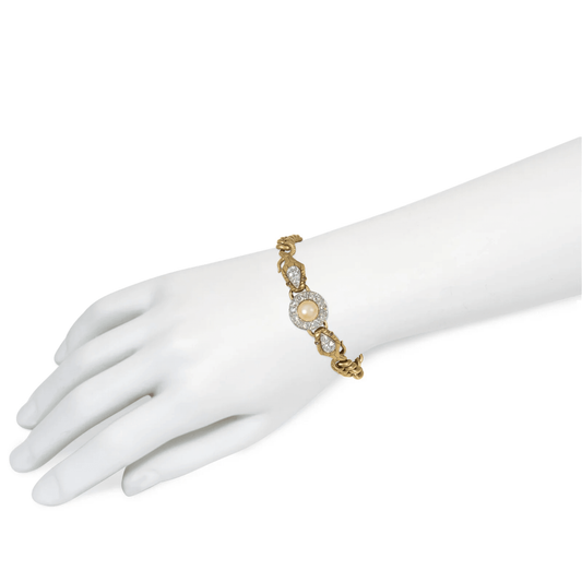 French Art Nouveau Platinum & 18KT Yellow Gold Pearl, Diamond & Ruby Bracelet on wrist