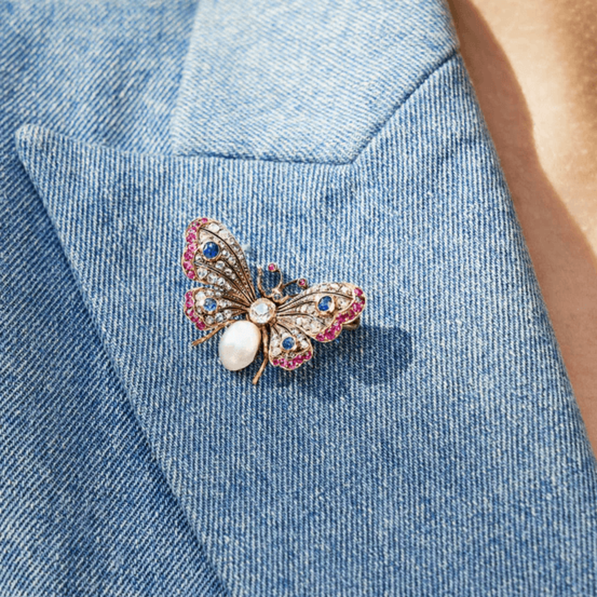 Victorian Silver & 18KT Yellow Gold Diamond, Emerald, Pearl, Ruby & Sapphire Butterfly Brooch on shirt